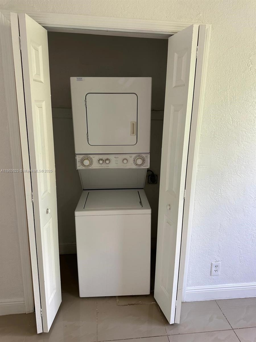 1250 Northwest 58th Street, Unit 1 Miami, FL 33142 - Photo 10 of 10 a utility room with dryer and washer