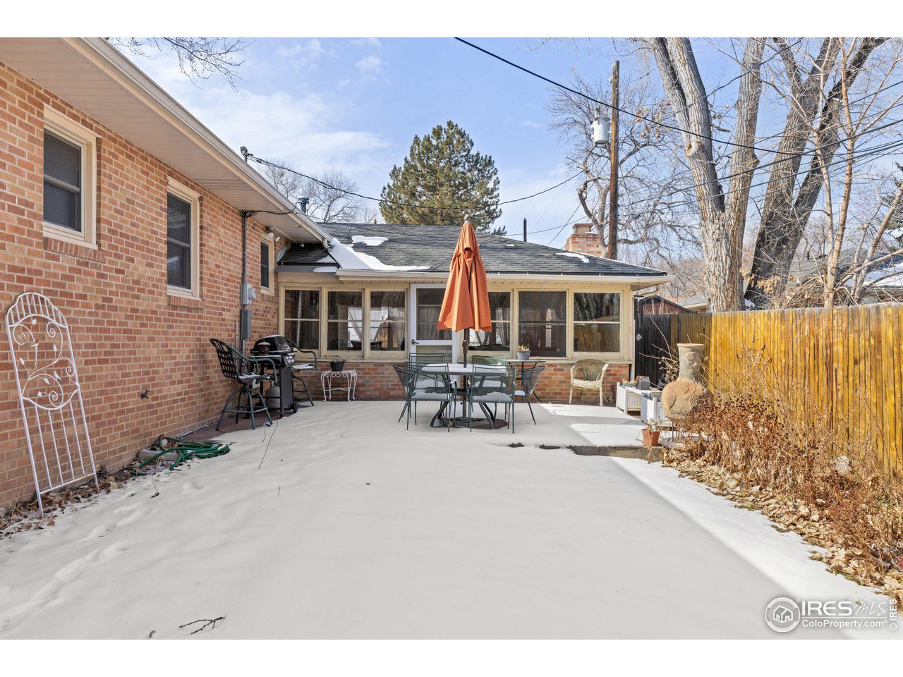 6 Sunset Circle Longmont, CO 80501 - Photo 22 of 37 a view of house with yard outdoor seating and barbeque oven