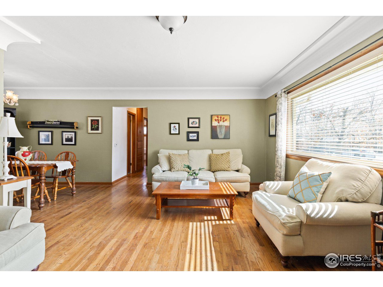 6 Sunset Circle Longmont, CO 80501 - Photo 3 of 37 a living room with furniture and a large window