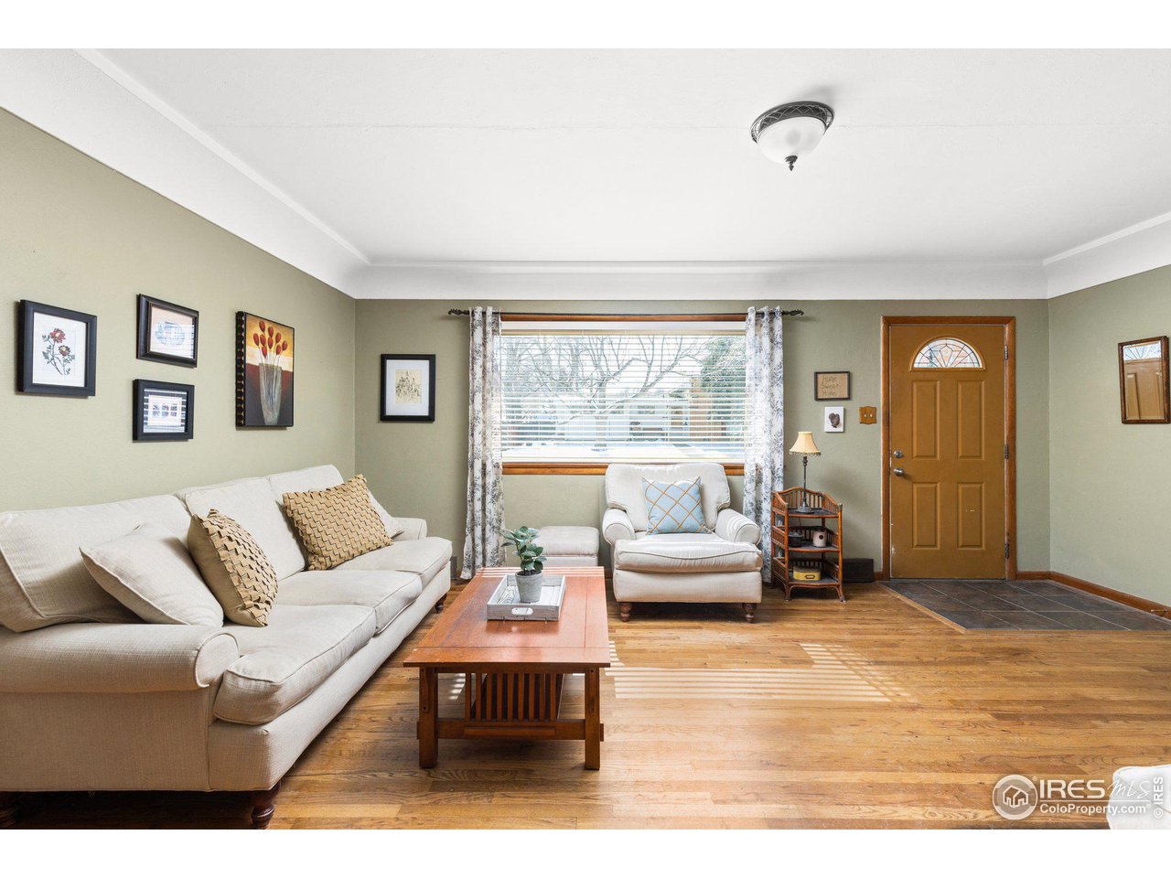 6 Sunset Circle Longmont, CO 80501 - Photo 7 of 37 a living room with furniture and a large window