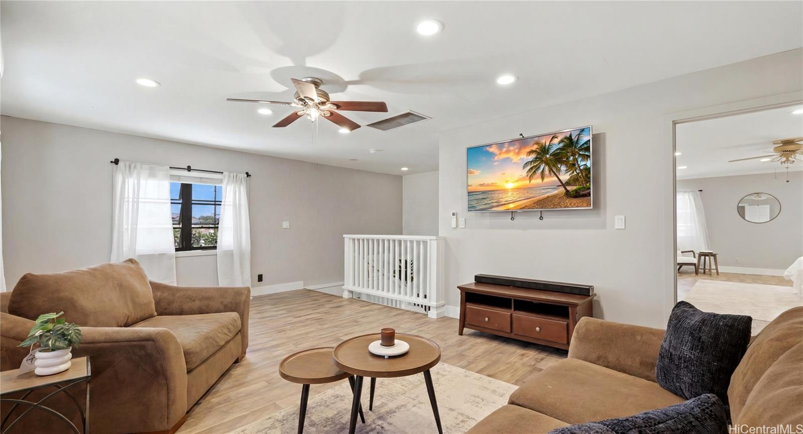 91-779 Fort Weaver Road Ewa Beach, HI 96706 - Photo 5 of 25 Huge, flexible upstairs loft space ideal for a second family room, media center, or home office.