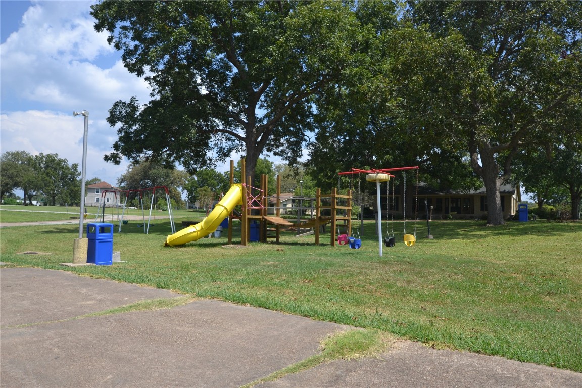 445 Carolcrest Lane, Unit 112 Livingston, TX 77351 - Photo 22 of 33 a view of a park with swings