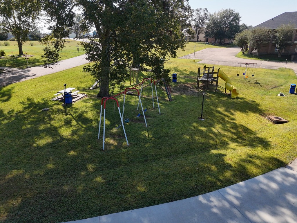 445 Carolcrest Lane, Unit 112 Livingston, TX 77351 - Photo 27 of 33 a view of a lake view