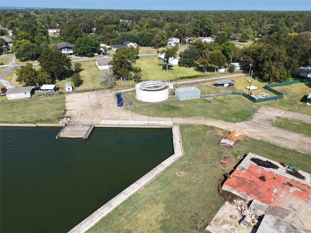 445 Carolcrest Lane, Unit 112 Livingston, TX 77351 - Photo 30 of 33 an aerial view of a house with a yard