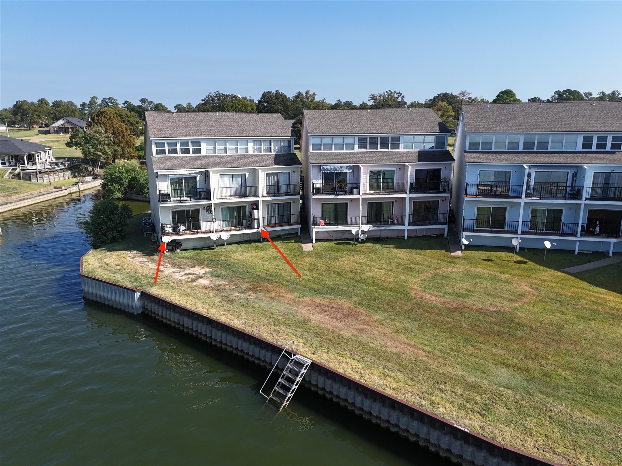 445 Carolcrest Lane, Unit 112 Livingston, TX 77351 - Photo 3 of 33 a view of a large pool with lawn chairs