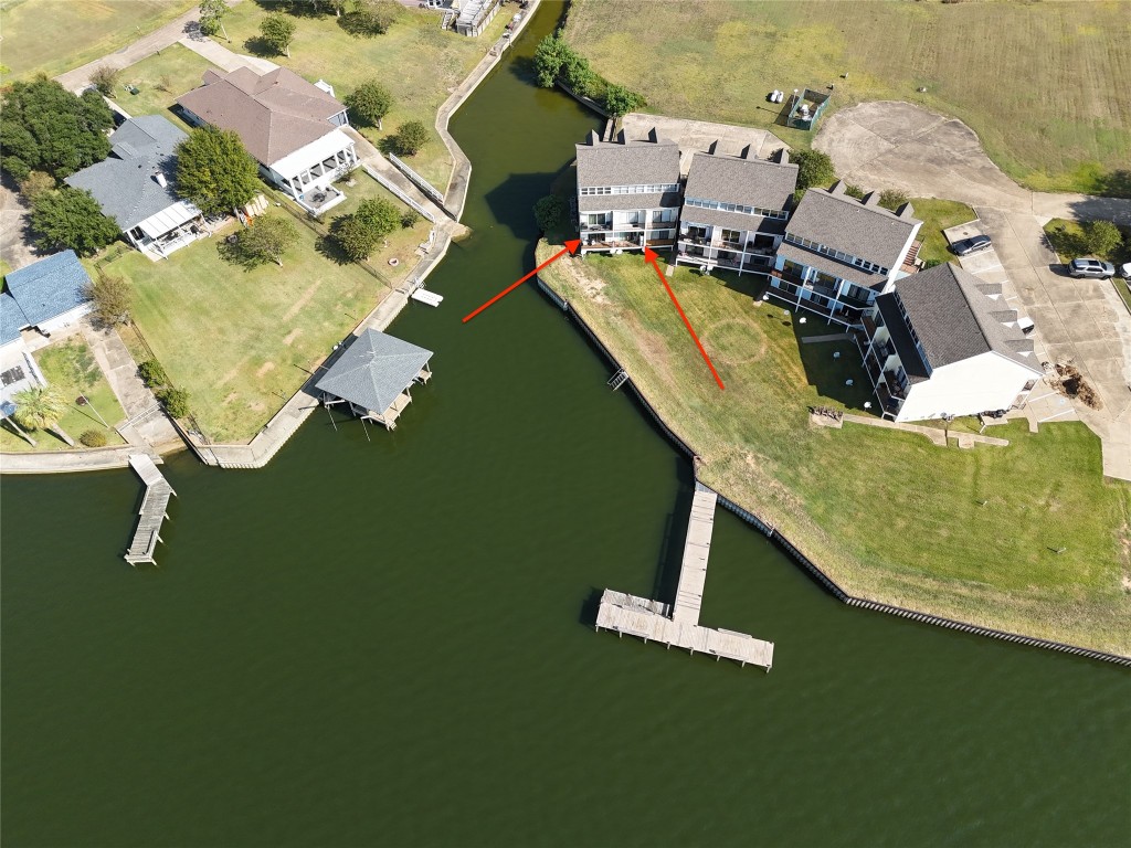 445 Carolcrest Lane, Unit 112 Livingston, TX 77351 - Photo 5 of 33 an aerial view of a house with a swimming pool