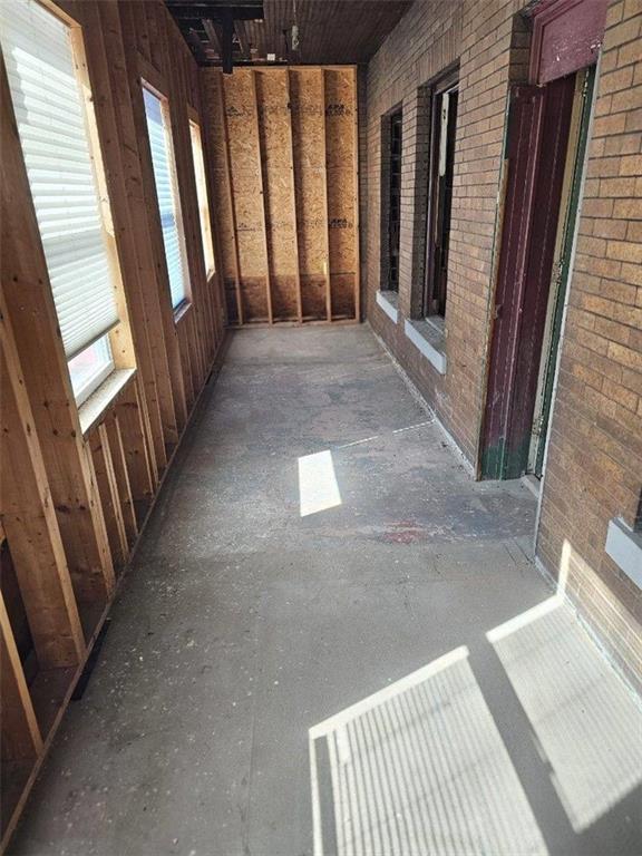 300 Longfellow Street Vandergrift, PA 15690 - Photo 15 of 34 a view of a hallway with wooden floor and staircase