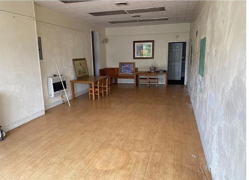 300 Longfellow Street Vandergrift, PA 15690 - Photo 2 of 34 a view of a livingroom with furniture and a window