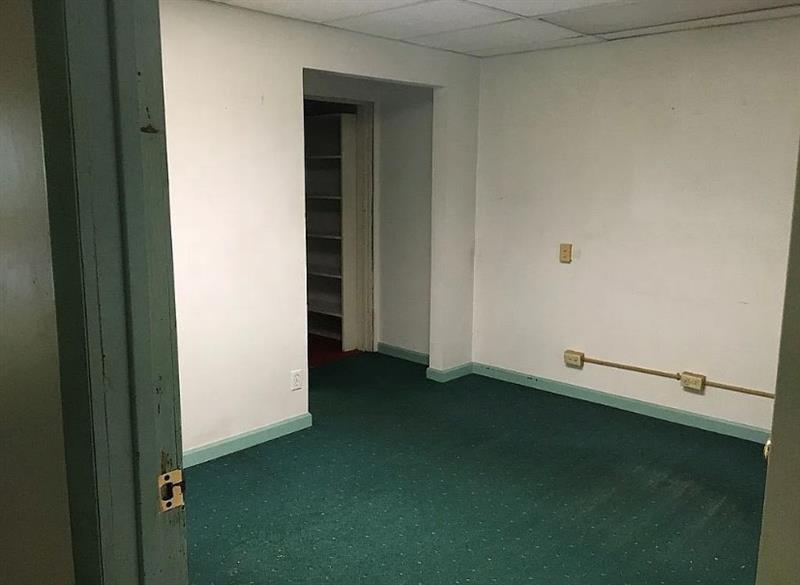 300 Longfellow Street Vandergrift, PA 15690 - Photo 5 of 34 an empty room with a door