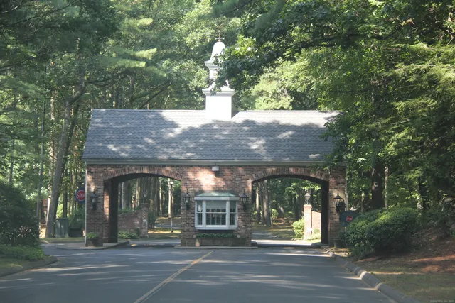a view of a house with a yard balcony
