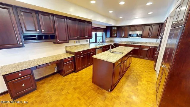 a view of a living room with a fireplace