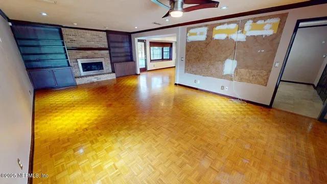 a room with cabinets and wooden floor