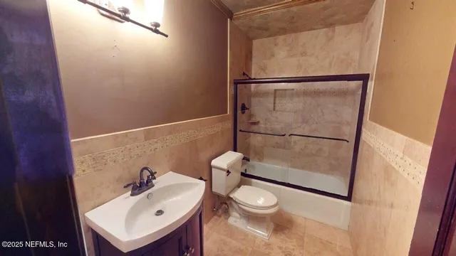 a bathroom with a sink double vanity and a mirror