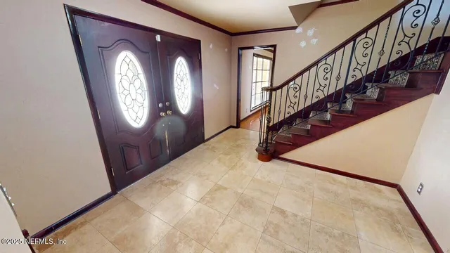 a kitchen with stainless steel appliances granite countertop wooden cabinets a sink and a stove