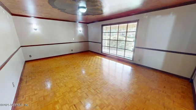 a kitchen with stainless steel appliances a refrigerator a oven a sink with granite countertops and cabinets