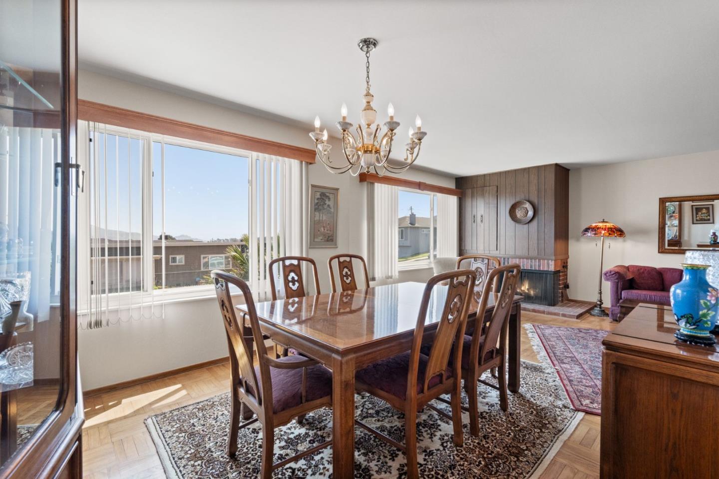 430 Higate Drive Daly City, CA 94015 - Photo 15 of 40 a dining room with furniture a chandelier and wooden floor