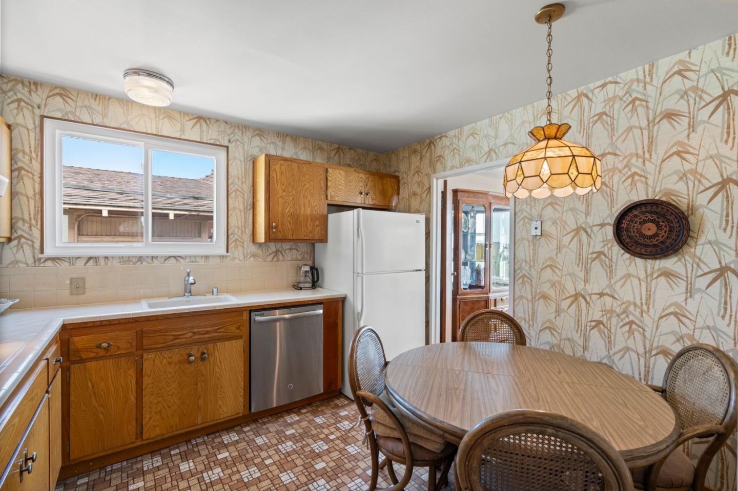 430 Higate Drive Daly City, CA 94015 - Photo 17 of 40 a dining room with furniture and window