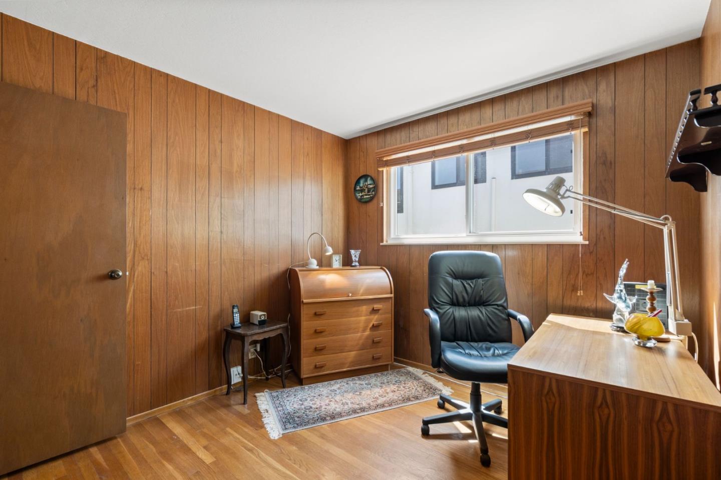 430 Higate Drive Daly City, CA 94015 - Photo 21 of 40 a workspace with furniture and window