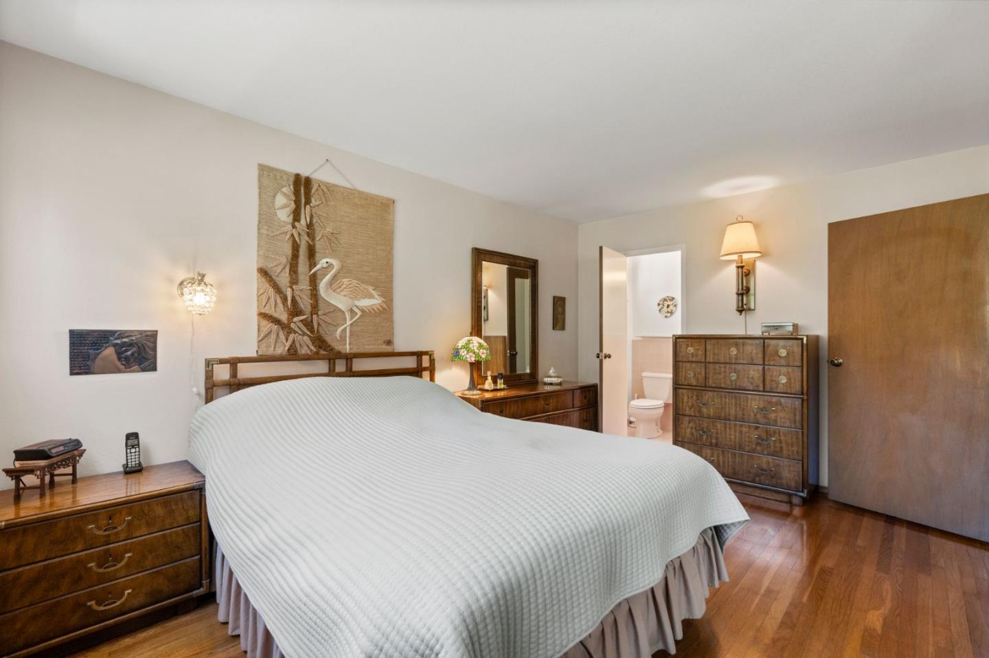 430 Higate Drive Daly City, CA 94015 - Photo 24 of 40 a bedroom with a bed and wooden floor