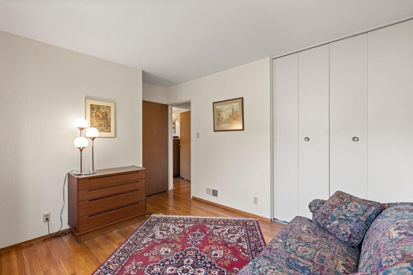 430 Higate Drive Daly City, CA 94015 - Photo 28 of 40 a bedroom with a bed and a dresser