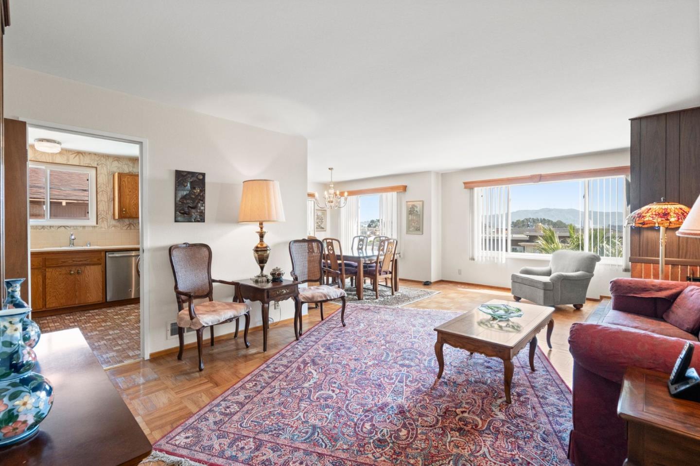 430 Higate Drive Daly City, CA 94015 - Photo 7 of 40 a living room with furniture a rug a lamp and a large window