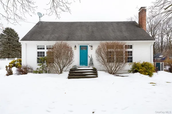 a front view of house with a yard