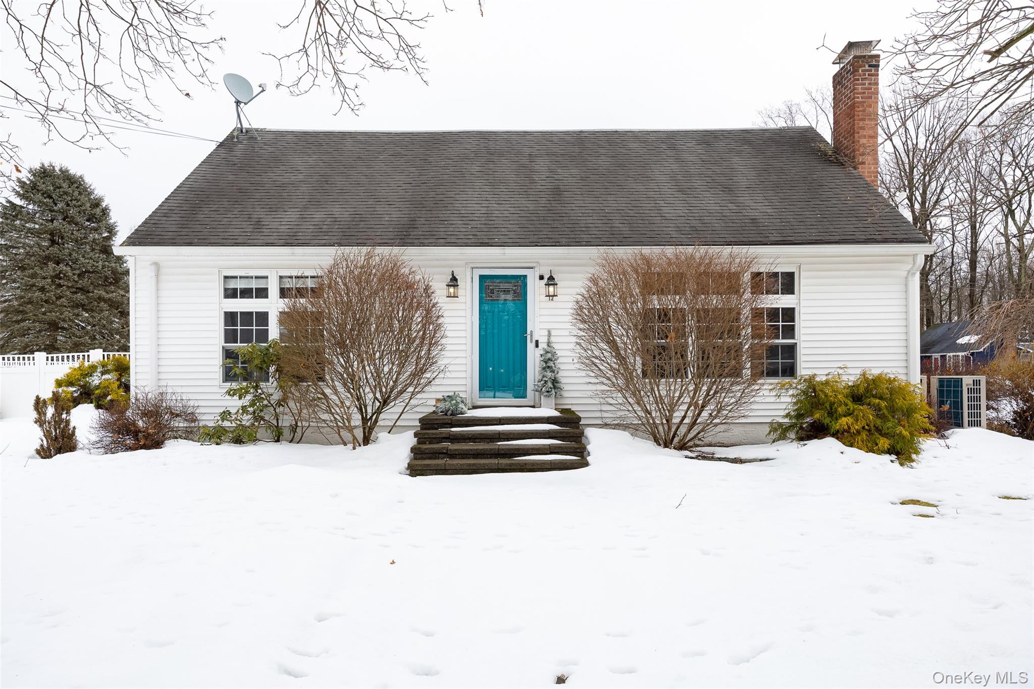 a front view of house with a yard
