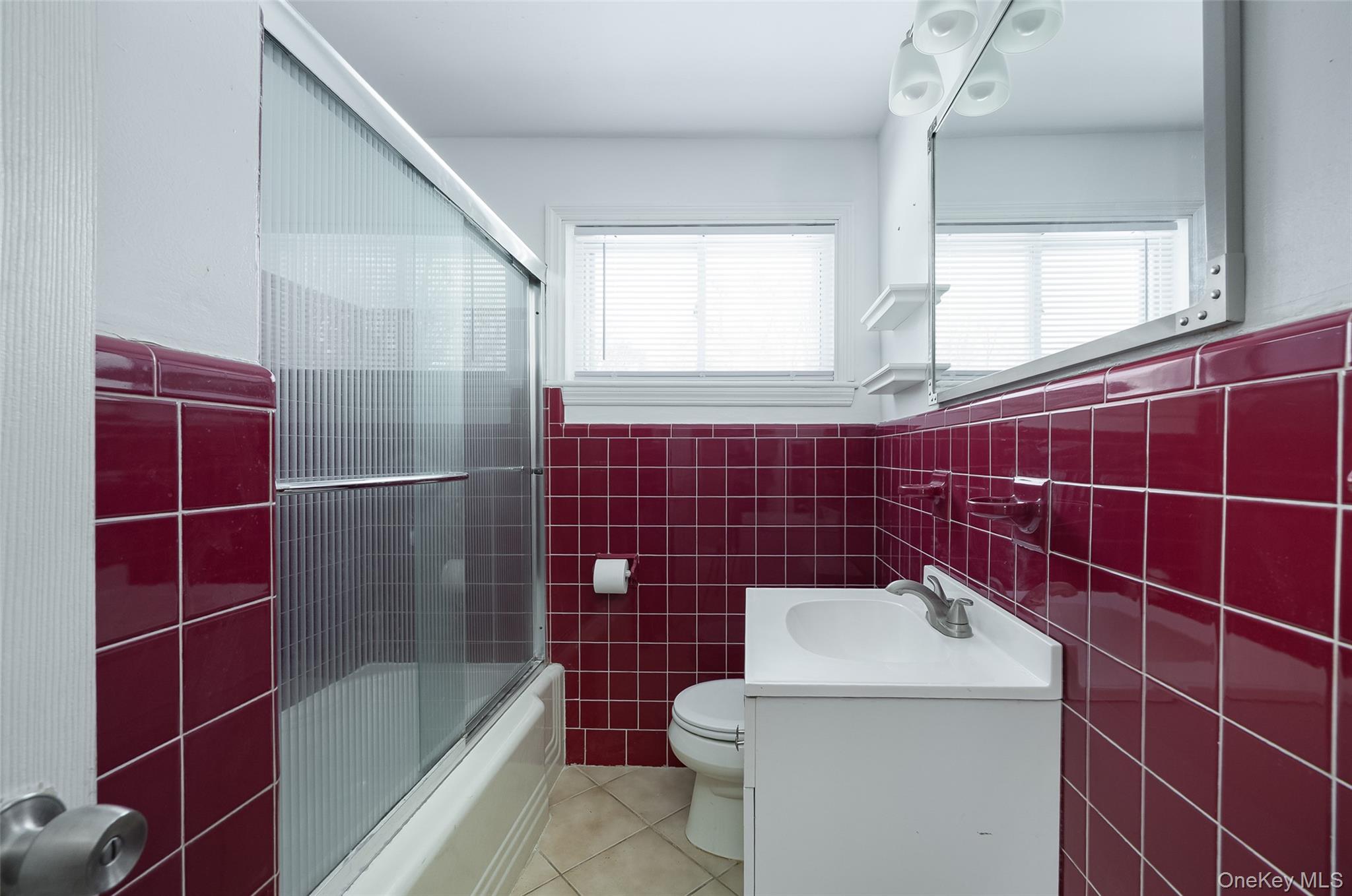 12 Valley View Road Hyde Park, NY 12538 - Photo 13 of 31 a bathroom with a toilet a sink and window