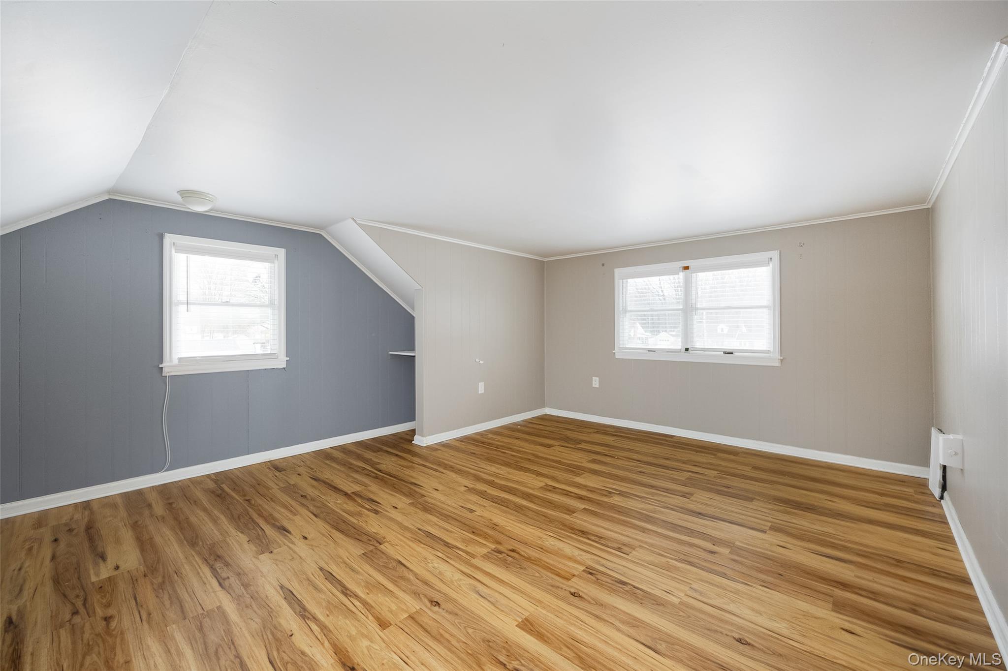 12 Valley View Road Hyde Park, NY 12538 - Photo 16 of 31 a view of an empty room with wooden floor and a window