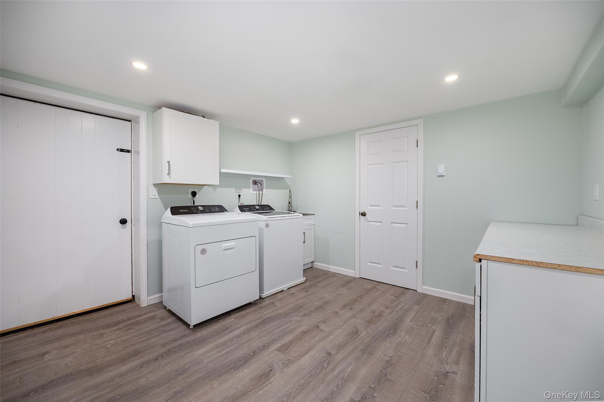 12 Valley View Road Hyde Park, NY 12538 - Photo 21 of 31 a kitchen with cabinets wooden floor and a sink