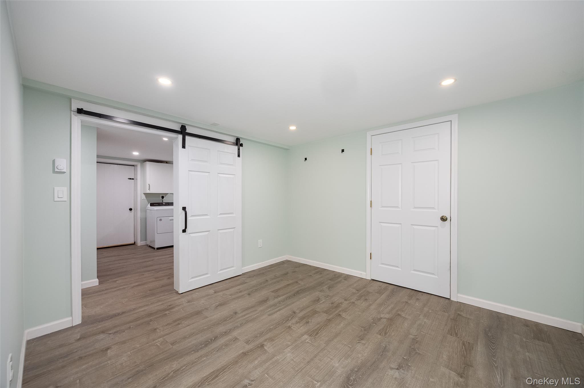 12 Valley View Road Hyde Park, NY 12538 - Photo 24 of 31 a view of a big room with wooden floor and windows