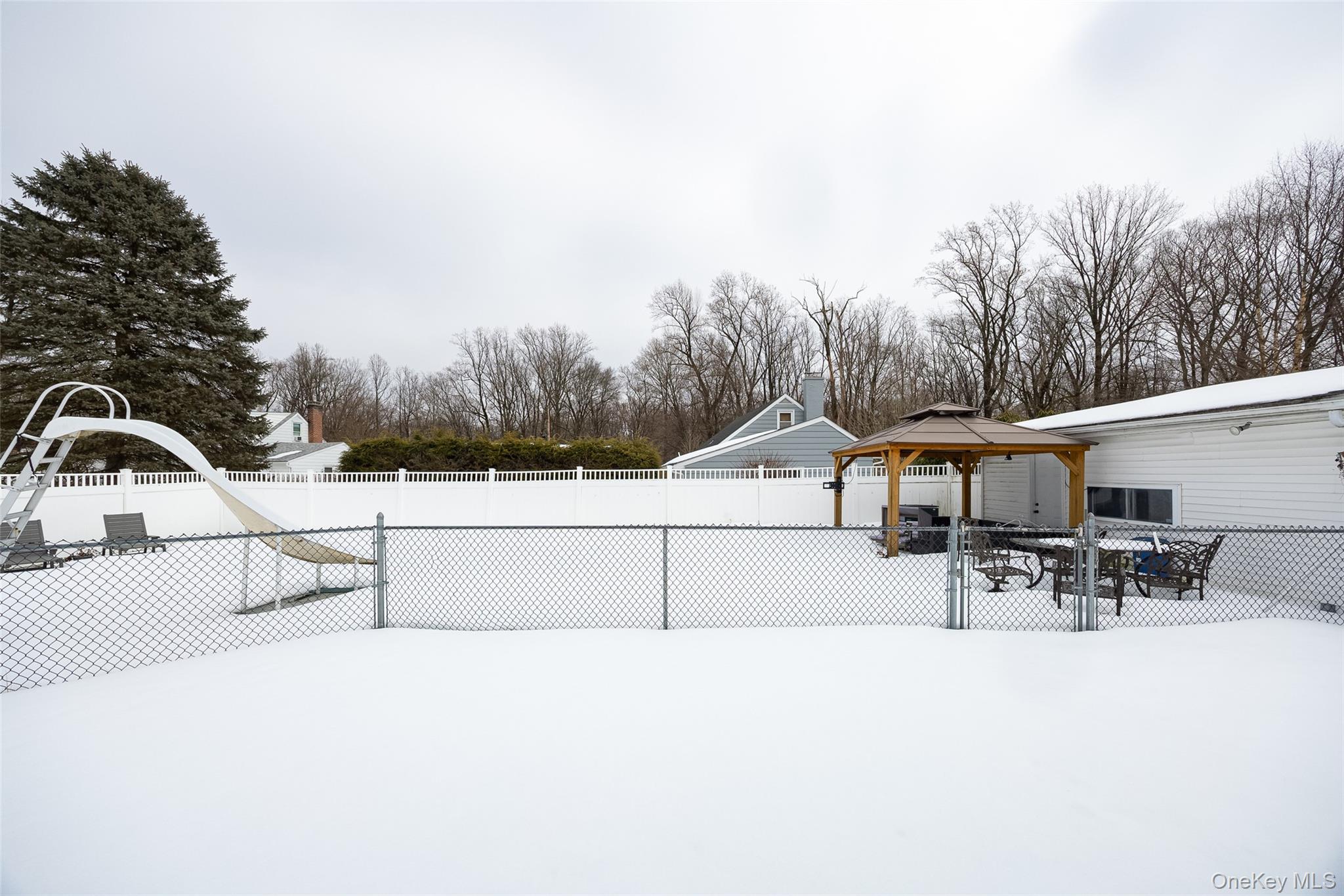 12 Valley View Road Hyde Park, NY 12538 - Photo 26 of 31 a view of a terrace with chairs and iron fence