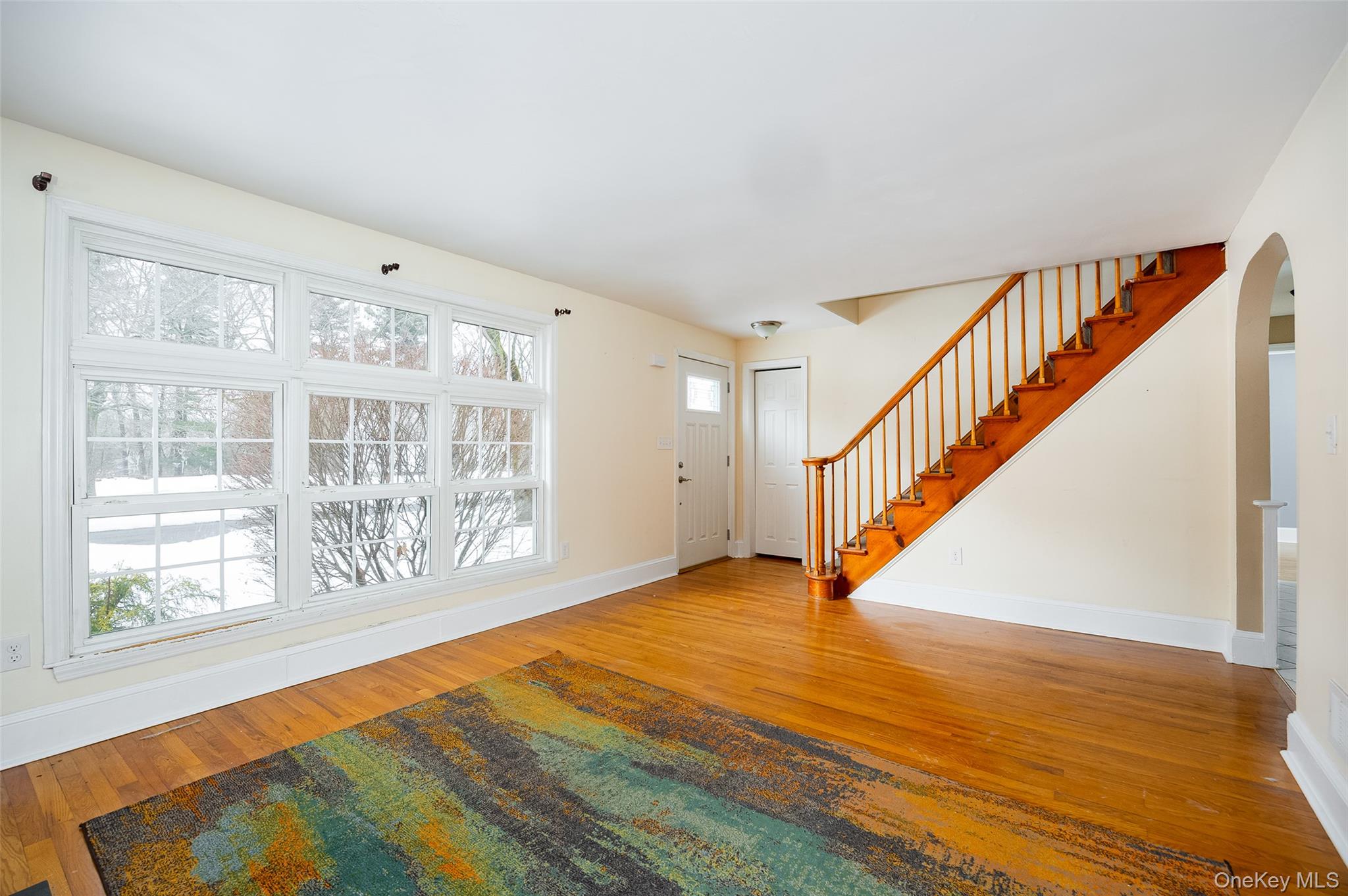 12 Valley View Road Hyde Park, NY 12538 - Photo 5 of 31 a view of an empty room with wooden floor and windows