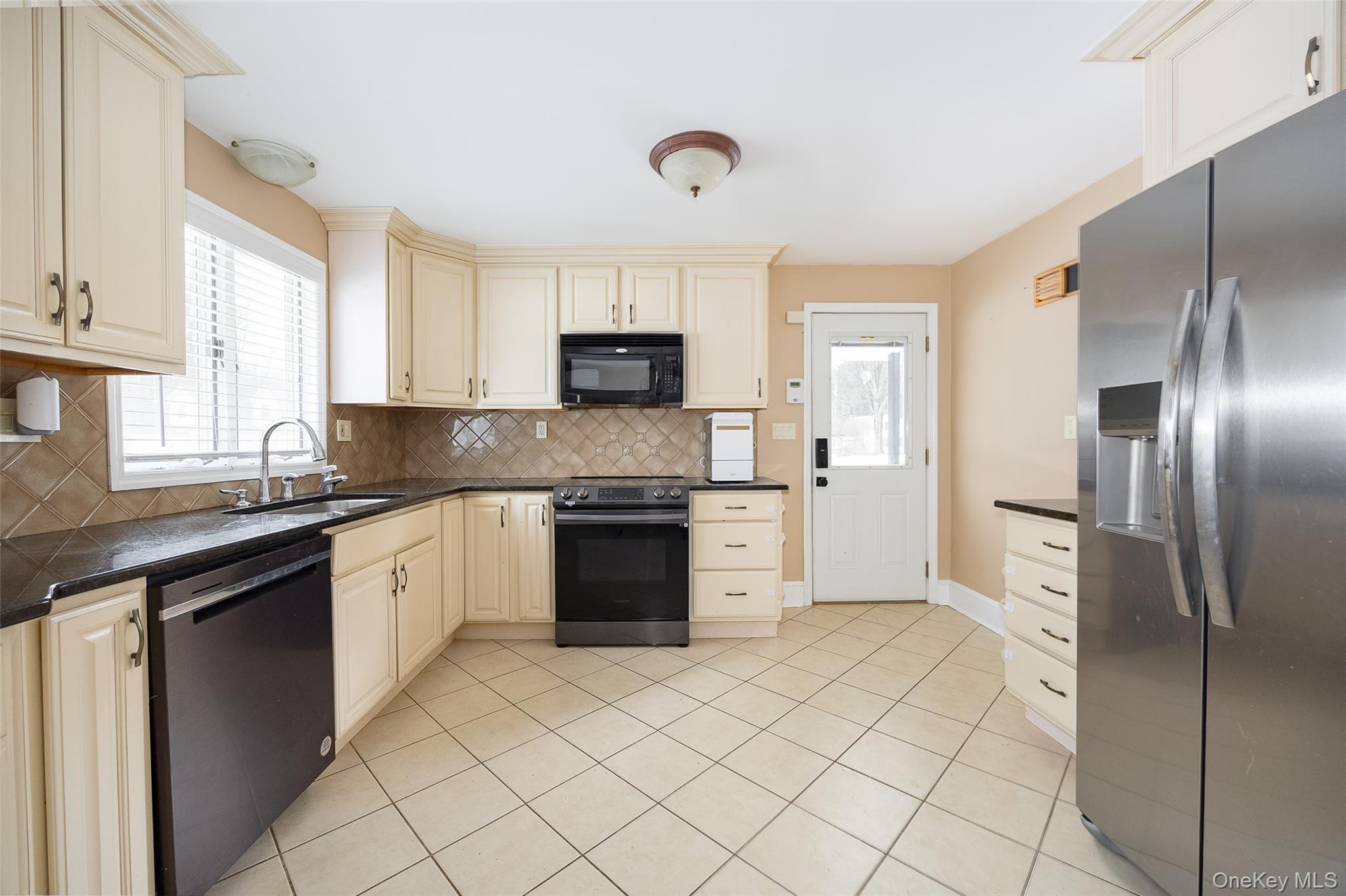 12 Valley View Road Hyde Park, NY 12538 - Photo 6 of 31 a kitchen with a sink stove and refrigerator