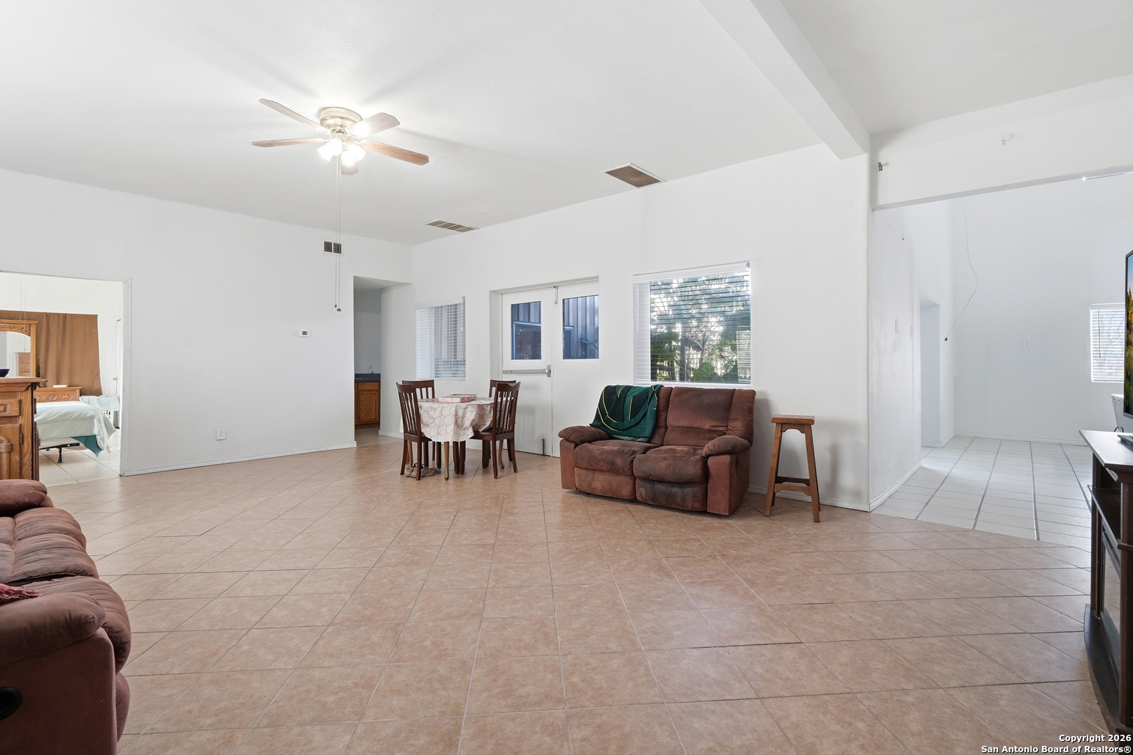 483 Sassman Road Marion, TX 78124 - Photo 12 of 39 a living room with furniture and a chandelier