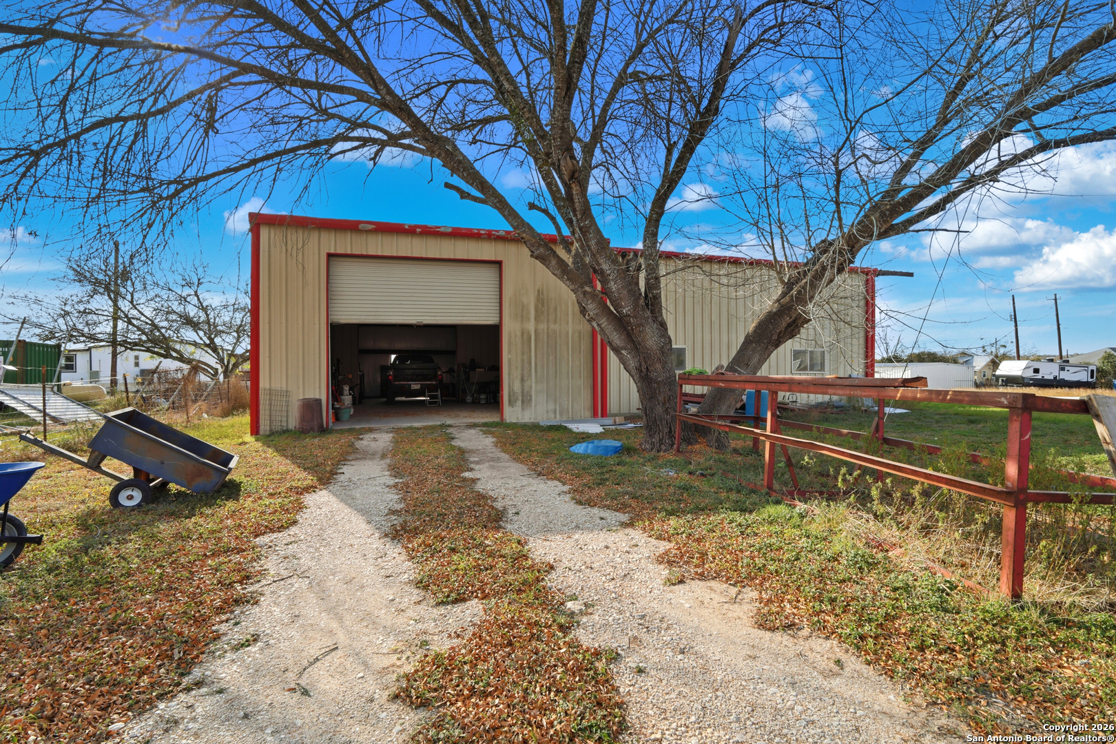 483 Sassman Road Marion, TX 78124 - Photo 6 of 39 a view of an house with backyard and a tree