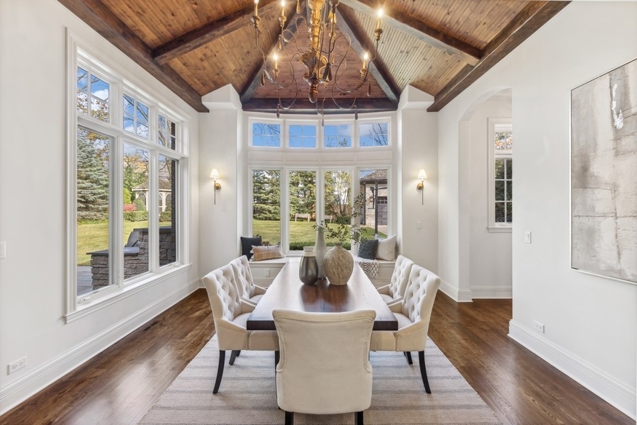 927 Cleveland Road Hinsdale, IL 60521 - Photo 15 of 46 a view of a dining room with furniture window and wooden floor