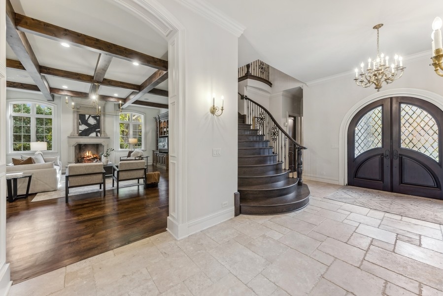 927 Cleveland Road Hinsdale, IL 60521 - Photo 16 of 46 a view of entryway with stairs and wooden floor