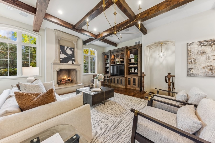 927 Cleveland Road Hinsdale, IL 60521 - Photo 19 of 46 a living room with furniture and a fireplace