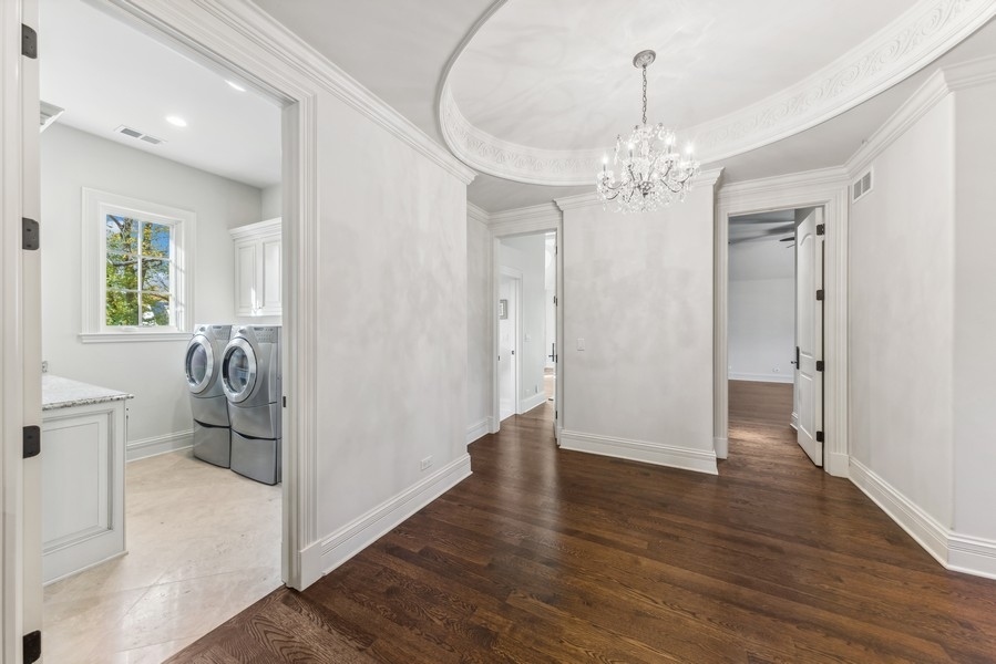 927 Cleveland Road Hinsdale, IL 60521 - Photo 26 of 46 a view of a livingroom with a chandelier