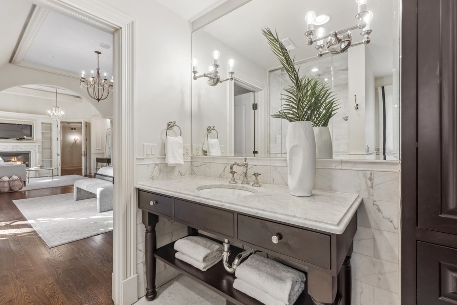 927 Cleveland Road Hinsdale, IL 60521 - Photo 30 of 46 a bathroom with a sink double vanity and a mirror