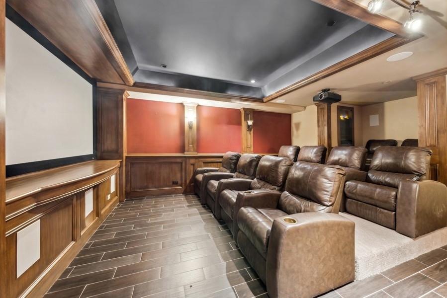 927 Cleveland Road Hinsdale, IL 60521 - Photo 36 of 46 a living room with furniture and a flat screen tv