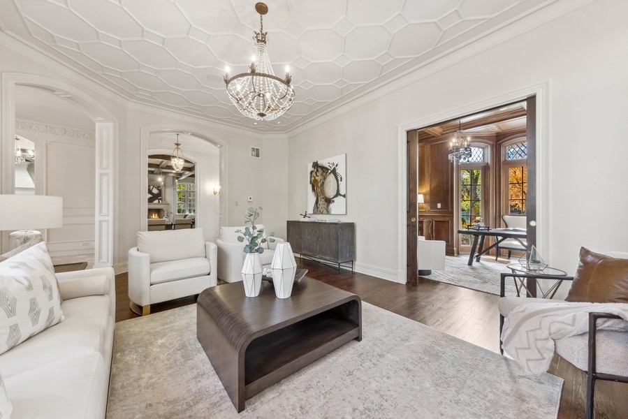 927 Cleveland Road Hinsdale, IL 60521 - Photo 4 of 46 a living room with furniture wooden floor and a chandelier