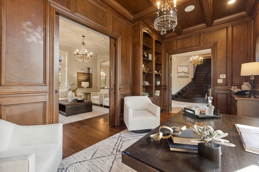 927 Cleveland Road Hinsdale, IL 60521 - Photo 5 of 46 a living room with furniture and a chandelier