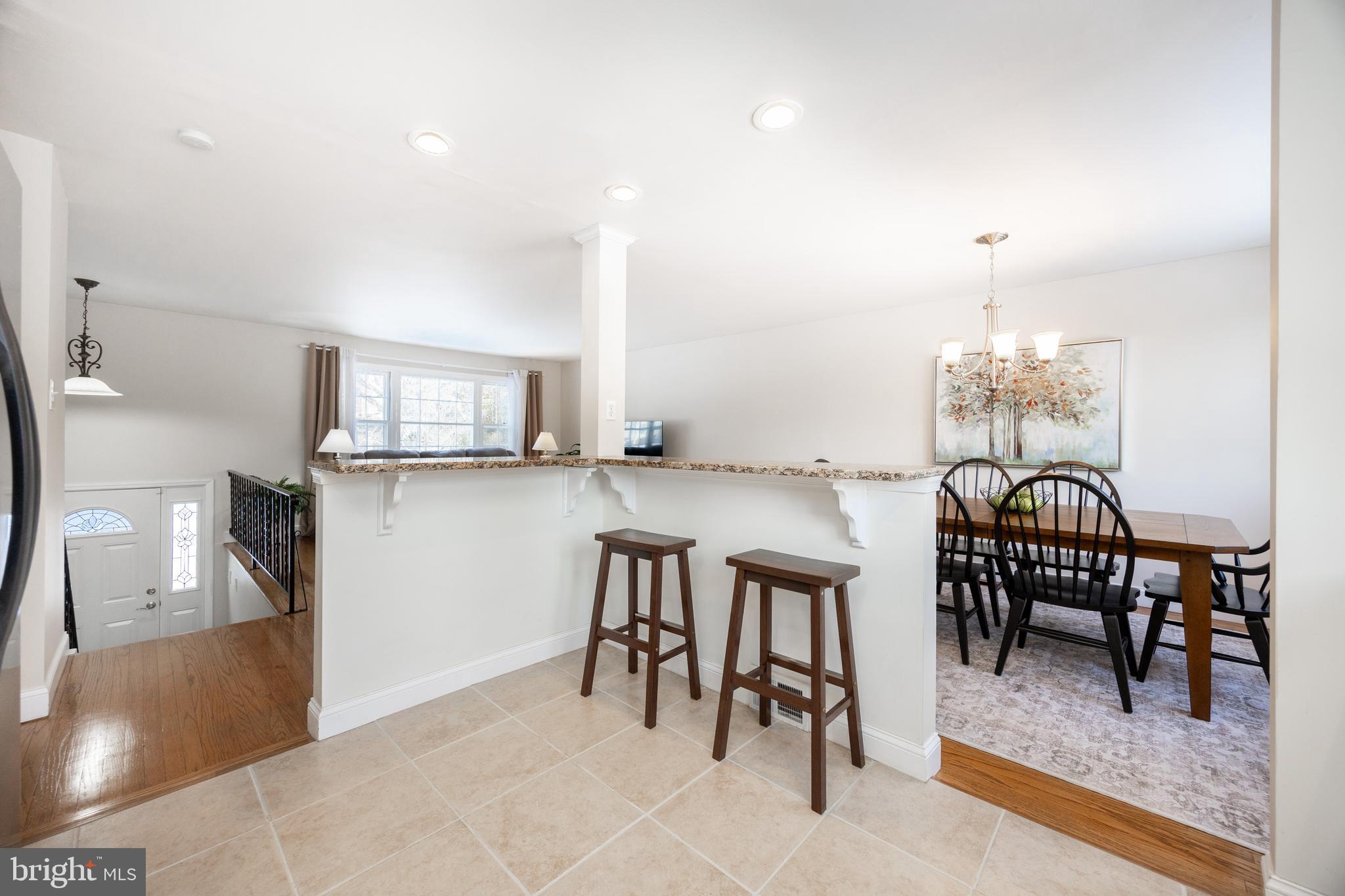305 Concord Avenue Exton, PA 19341 - Photo 13 of 38 a view of a a dining room with furniture window and wooden floor