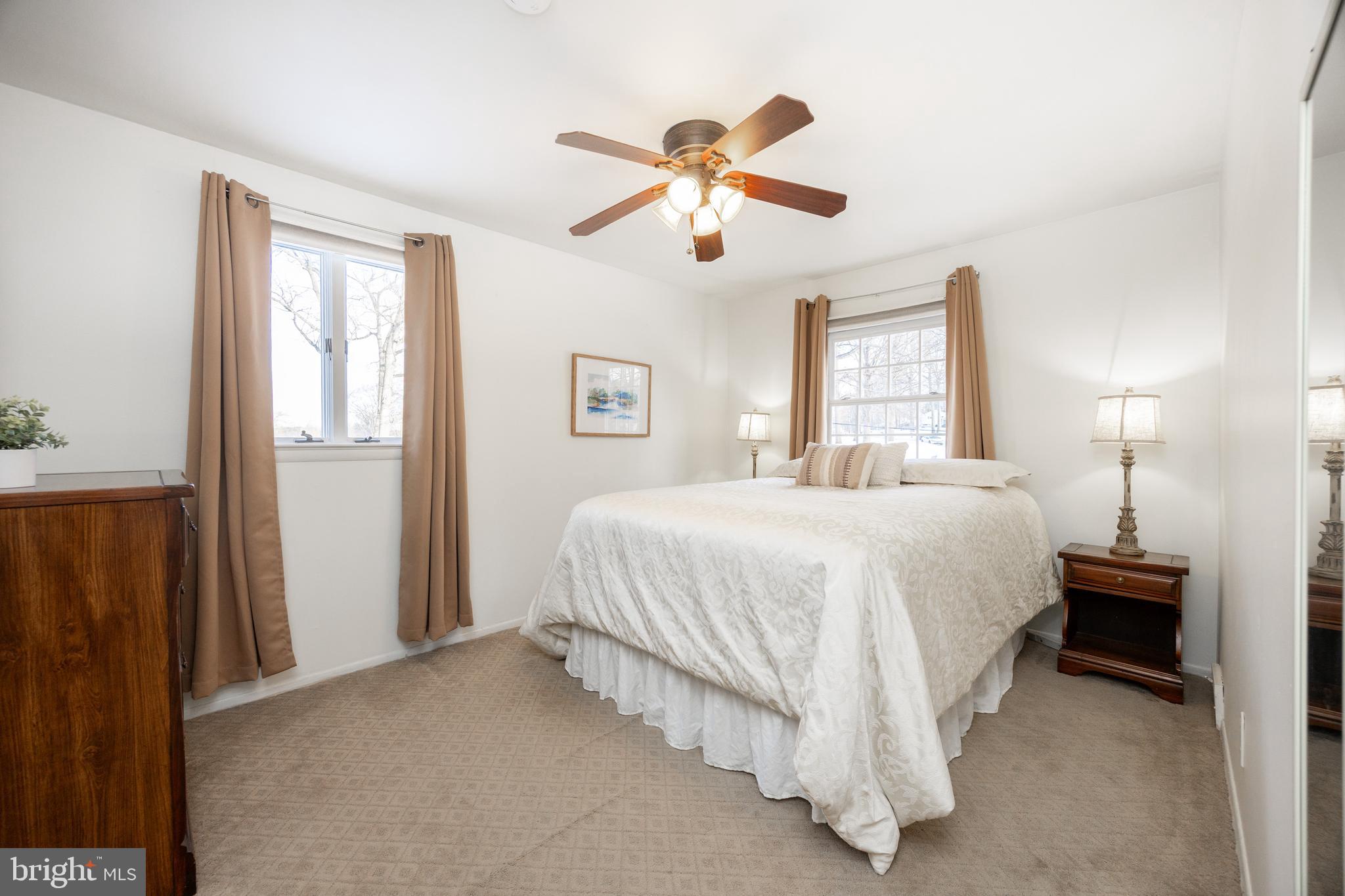 305 Concord Avenue Exton, PA 19341 - Photo 17 of 38 a spacious bedroom with a bed and window