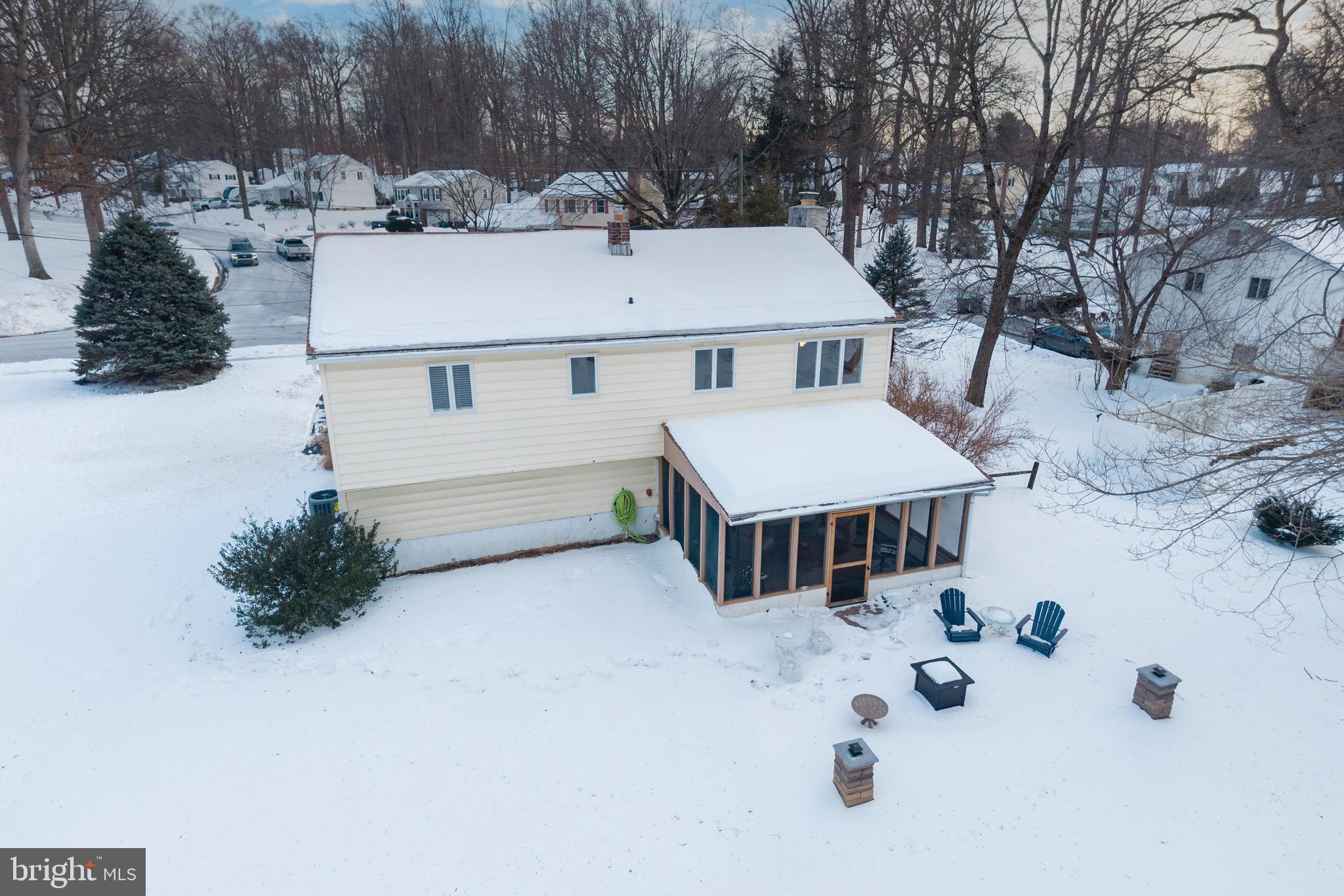 305 Concord Avenue Exton, PA 19341 - Photo 2 of 38 a view of a house with a yard and sitting area
