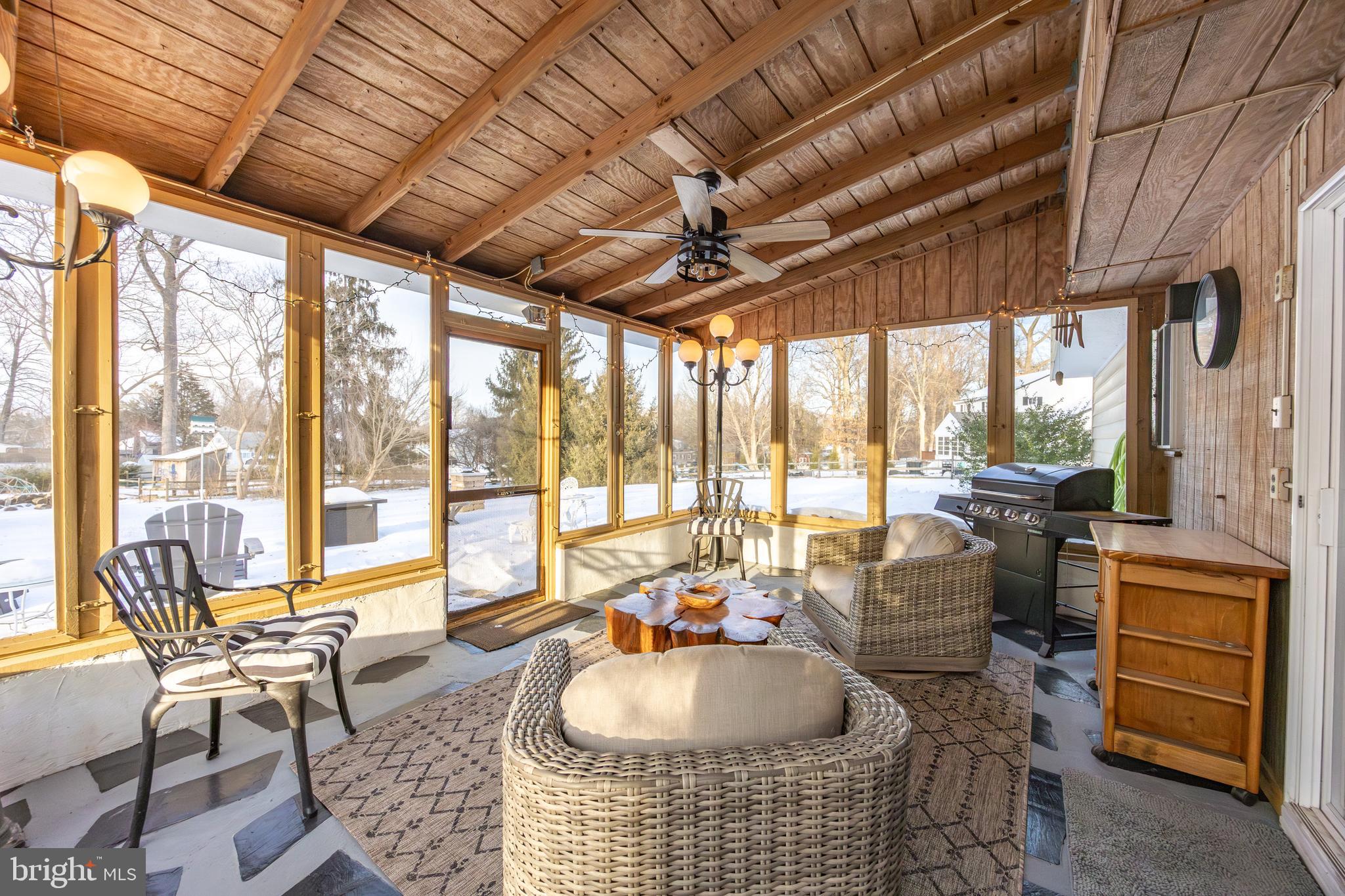 305 Concord Avenue Exton, PA 19341 - Photo 29 of 38 a living room with furniture and a floor to ceiling window