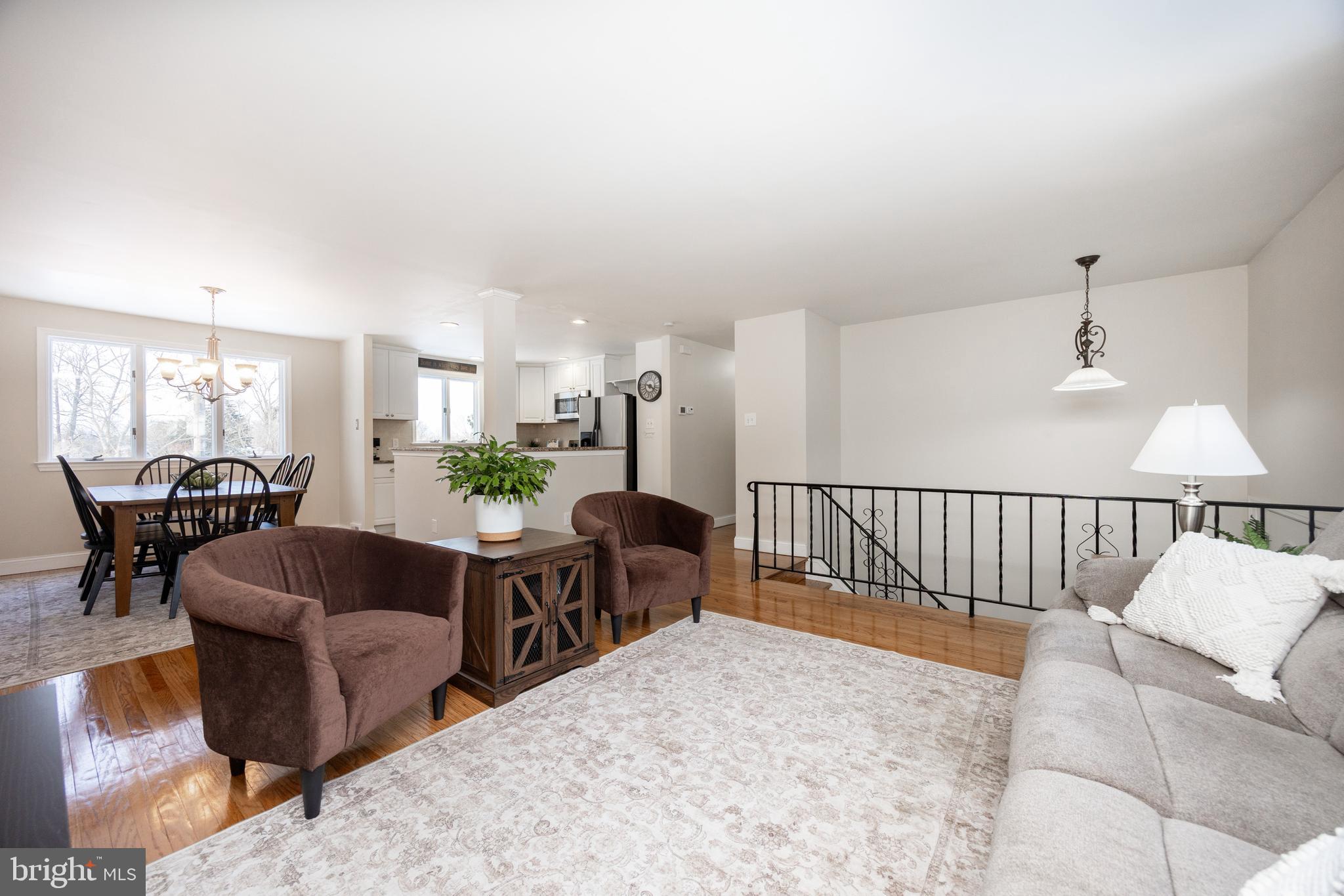 305 Concord Avenue Exton, PA 19341 - Photo 6 of 38 a living room with furniture kitchen view and a large window