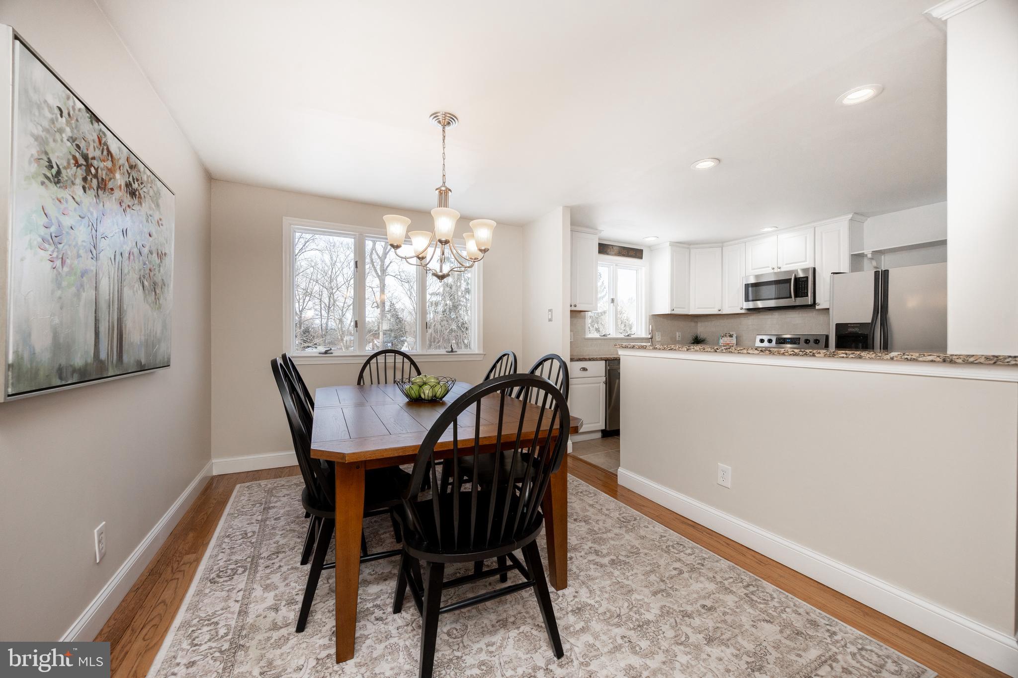 305 Concord Avenue Exton, PA 19341 - Photo 9 of 38 a view of a dining room with furniture window and wooden floor